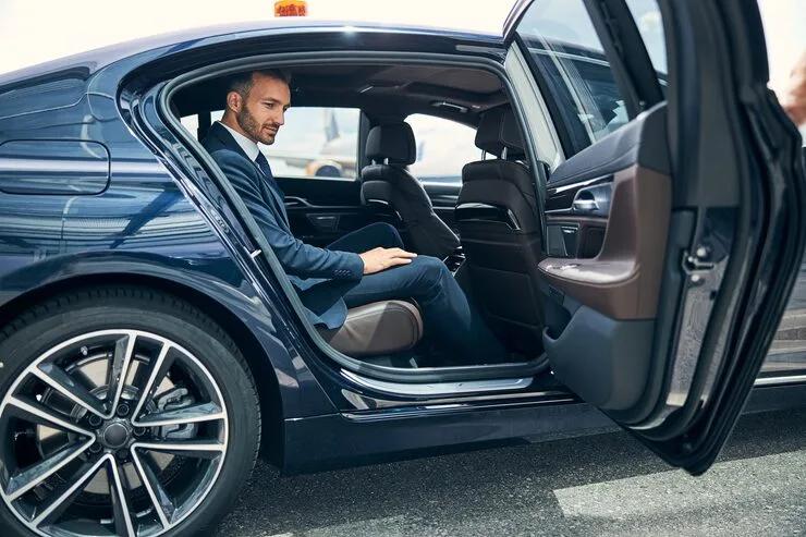 Executive cab service luxury vehicle with professional chauffeur