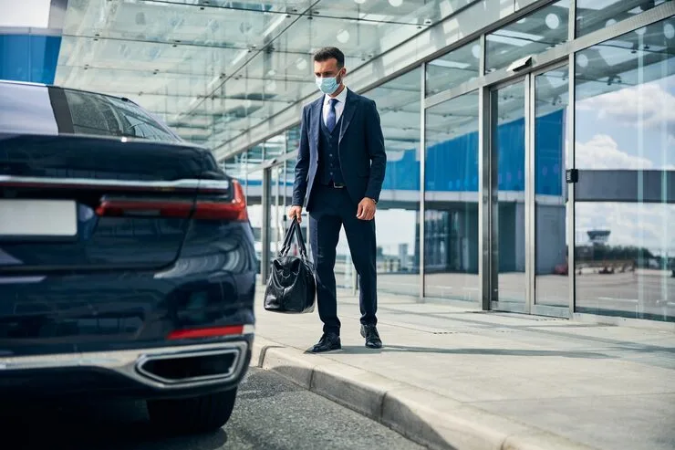 Luxury executive airport transfer car with professional chauffeur in the UK
